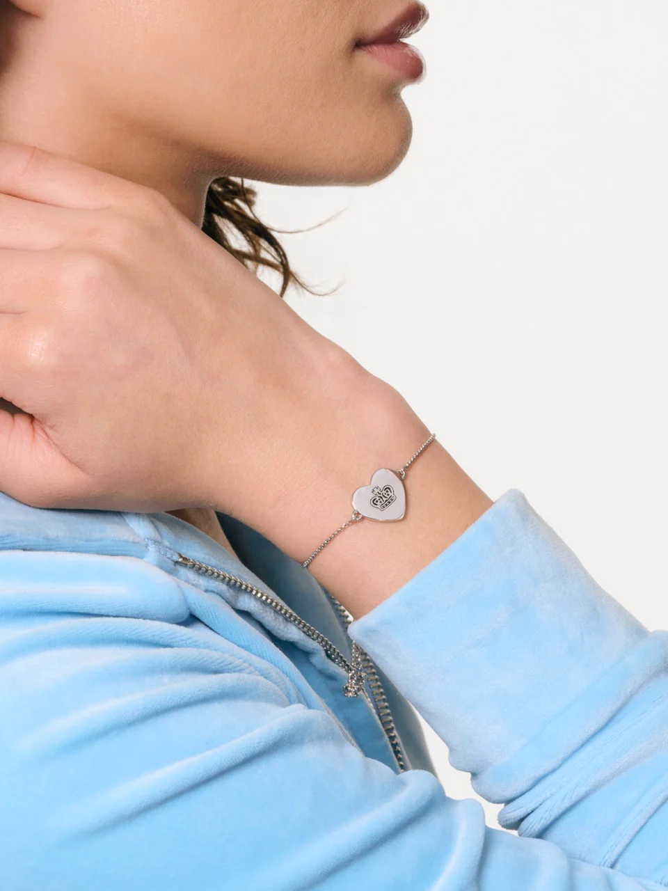 SILVER TONE JUICY COUTURE REVERSIBLE HEART ADJUSTABLE BRACELET - Image 2